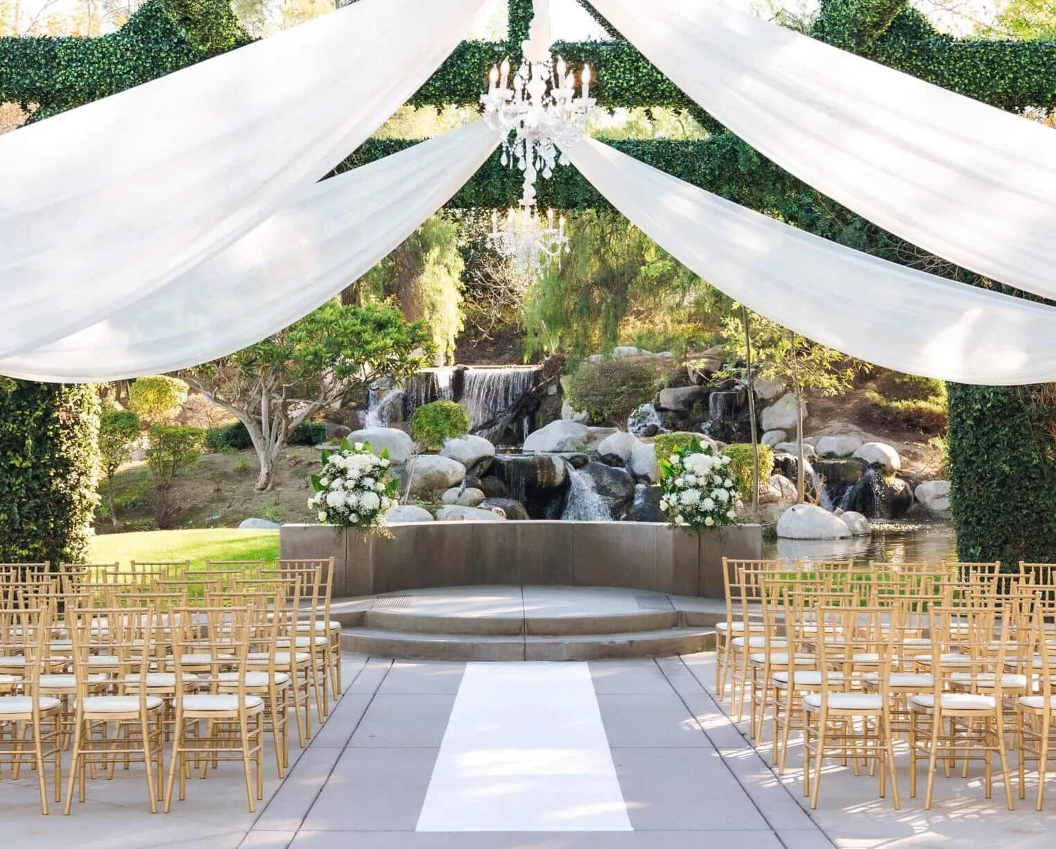 Chairs and florals set for a ceremony