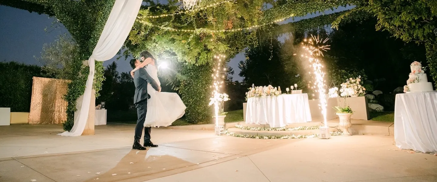 A first dance under sparklers on the terrace